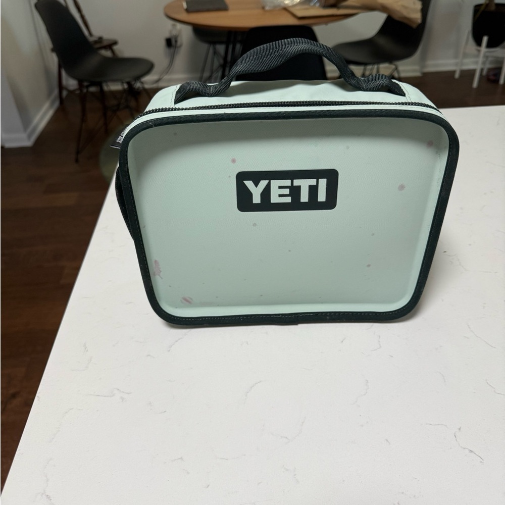 YETI Lunch Bag - Mint and Black.  Wax from a candle spatters.